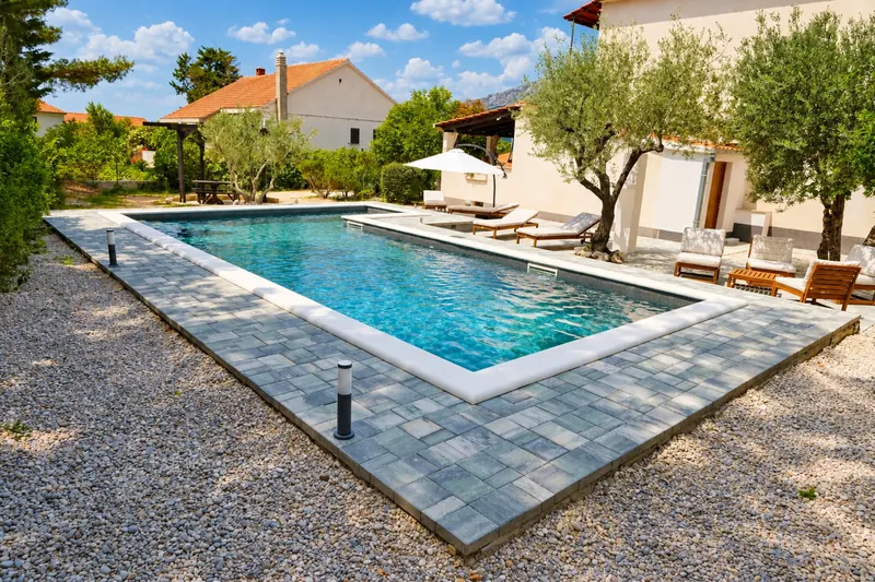 Saltwater pool and terrace in daylight