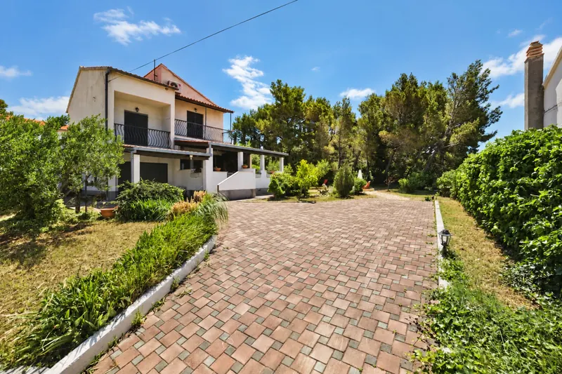 Villa exterior, driveway and garden