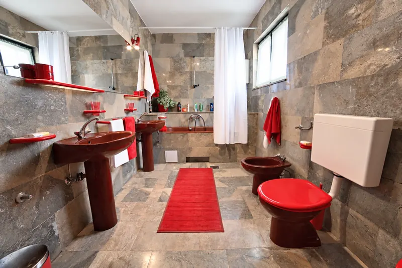 Bathroom with bath and two basins